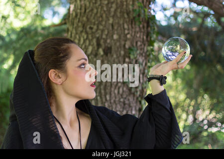 Woman in dark dress Stock Photo