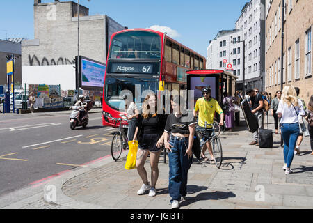 A 67 double decker bus on Shoreditch High Street, London, UK Stock Photo