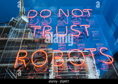 Eve De Haan's Do Not Trust Robots neon sign and tins of spam in a shop window on Leonard Street, London, EC2, England, UK Stock Photo