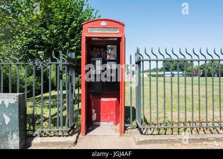 A vandalised red K2 phone box in London, UK Stock Photo