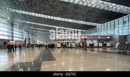 KOLKATA, INDIA - JUL 29, 2015. People waiting for check-in at Departure Hall of Netaji Subhash Chandra Bose International Airport in Kolkata, West Ben Stock Photo