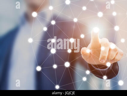 Person touching a network chart showing connections between nodes or servers, concept about the world wide web internet and data communications Stock Photo