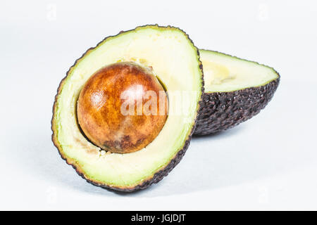 Avocado cut in half. Stock Photo