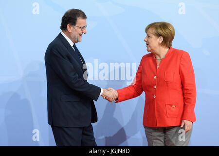 Hamburg, Germany. 07th July, 2017. German Chancellor Angela Merkel welcomes Spanish President Mariano Rajoy at the start of the first day of the G20 Summit meeting July 7, 2017 in Hamburg, Germany. Credit: Planetpix/Alamy Live News Stock Photo