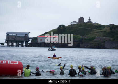 Wales Swim 2017, Tenby, Pembrokeshire, West Wales, UK. This years swim includes entries for 5000 amateur and professional athletes from 50 countries on a 1.2 mile or 2.4 mile swim, depending on entry level, around the North Beach. Athletes are competing for the Long Course Weekend Champion. Credit: Andrew Bartlett/Alamy Live News Stock Photo