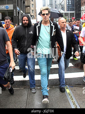 New York, USA. 7th Jul, 2017. Milo Yiannopoulos writer of Dangerous hold press conference in front of Simon Schuster office and march up 6th Avenue heading back to his hotel in New York July 07, 2017. Credit: MediaPunch Inc/Alamy Live News Stock Photo