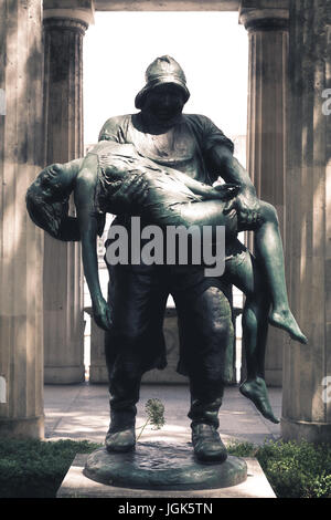 Berlin, Germany - July 06 , 2017: Der Fischer 'Gerettet' ( The fisher 'saved') statue at Old Museum garden, Museum Island in Berlin, Germany Stock Photo