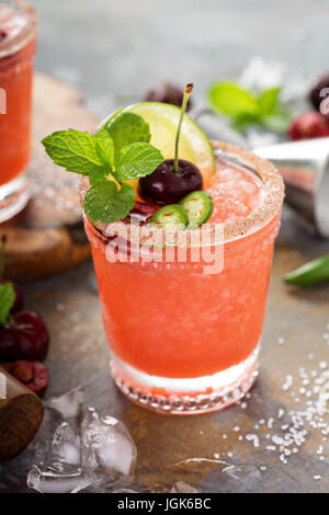 Refreshing summer cocktail with cherry Stock Photo