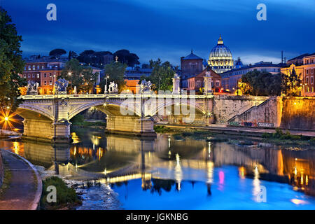 The dome of St Peter's Basilica and Ponte Vittorio Emanuele II, as seen from Ponte Sant'Angelo, Rome, Italy.