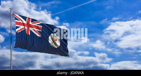 Cayman Islands flag waving on a blue sky background. 3d illustration Stock Photo