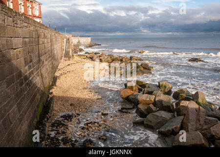 The headland at Hartlepool,England,UK with the waves crashing against the rocks and sea walls Stock Photo