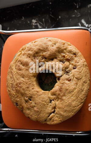 typical neapolitan casatiello with salami and cheese, baked in Easter. Stock Photo