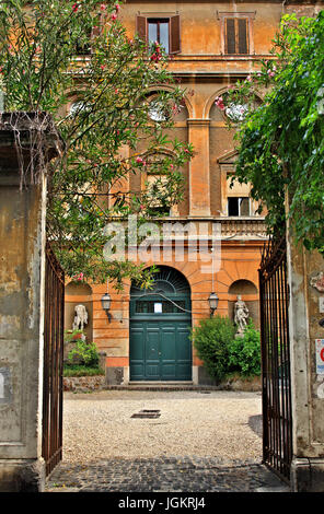 Beautiful building with courtyard, in Via Margutta between Piazza di Spagna and Piazza del Popolo, Rome, Italy. Stock Photo