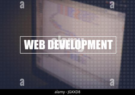 web development with code on screen blurring background Stock Photo