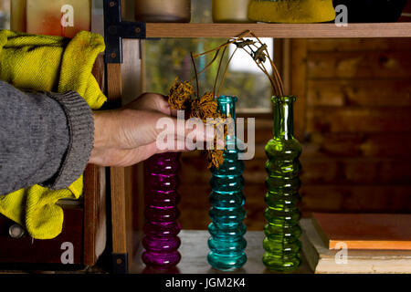 Man Wiping Dust Stock Photo