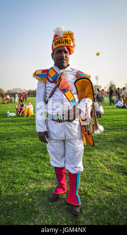 PUSHKAR, INDIA - MAR 7, 2012. Portrait of a guard at colorful ethnic attire perform in Pushkar, India. Pushkar is one of the most ancient cities of In Stock Photo