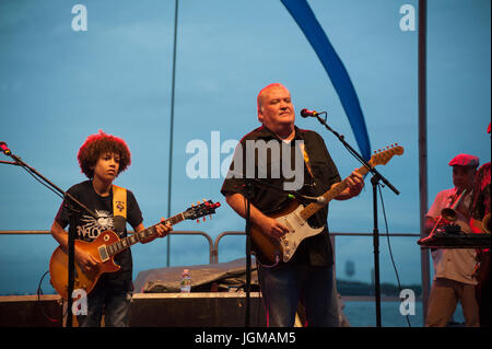 David Hidalgo, a founder of the rock band from East Los Angeles, Los Lobos, playing at the annual River and Blues festival in Battery Park City. July  Stock Photo