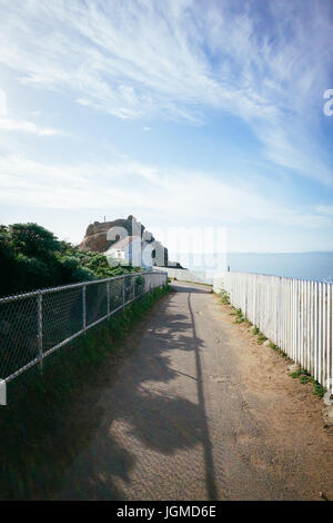 Path leading down towards the Point Bonita Lighthouse Stock Photo