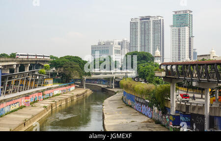 Kuala Lumpur, Malaysia - Jun 6, 2015. Cityscape with canal in Kuala Lumpur, Malaysia. Kuala Lumpur is the national capital of Malaysia as well as its  Stock Photo