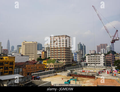 Kuala Lumpur, Malaysia - Jun 6, 2015. Cityscape with construction site in Kuala Lumpur, Malaysia. Stock Photo