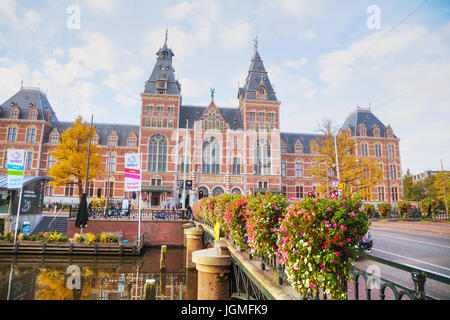 AMSTERDAM - OCTOBER 30: Rijksmuseum with people on October 30, 2016 in Amsterdam, Netherlands. Stock Photo