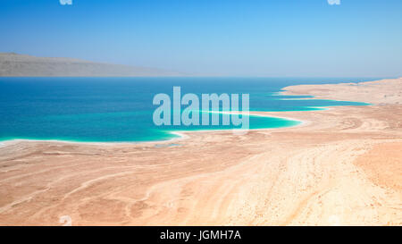 Dead Sea salt lake surface shores and beaches are 430 metres below sea level, Earth's lowest elevation on land. Stock Photo