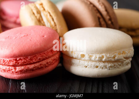 Texture of white and pink macaroons macro on the table. horizontal Stock Photo