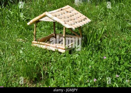 Fodder Rack Animals fodder rack for birds Stock Photo - Alamy
