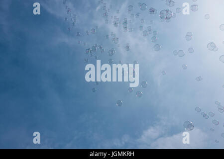 soap bubbles against blue sky Stock Photo
