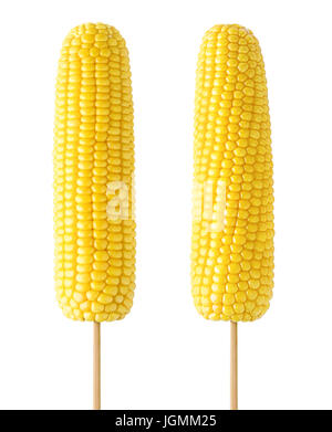 Isolated corns. Two cooked sweet corns on wooden sticks isolated on white background with clipping path Stock Photo