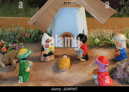 Dutch nativity scene with Holland windmill and the Three Kings who bring gifts Stock Photo