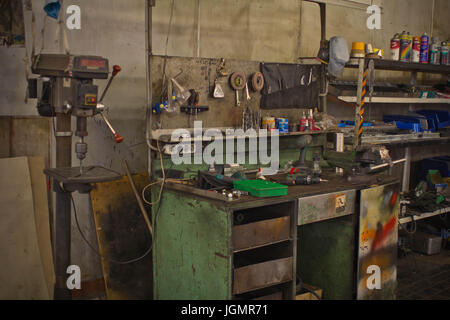 Workshop tool board with various hand tools for repairing and woodworking. Stock Photo