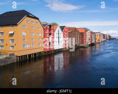 View along River Nidelva flanked by well maintained colourful buildings Trondheim city and municipality in Sør-Trøndelag county Norway Stock Photo