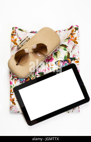Above, empty tablet, Outfit of casual and modern woman on isolated white background. Stock Photo