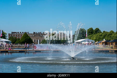 Water fountain in front of Hampton Court Palace at RHS Hampton Court Flower Show, London, England, UK Stock Photo