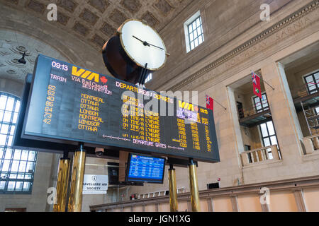 Toronto, Canada - 26 June 2017: information booth with schedule at Union Station Stock Photo