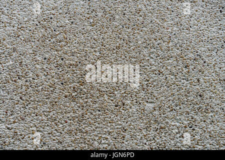 Small pebbles wall texture Stock Photo