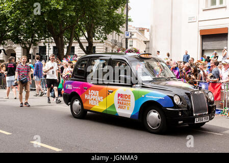 London, UK. 8th July, 2017. Black cab apinted in raimbow colours during Pride London 2017. Thousand of people join the annual LGBT  parade through the capital. Credit: Nicola Ferrari/Alamy Live News Stock Photo