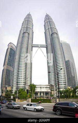 Kuala Lumpur, Malaysia - Jun 6, 2015. Petronas Twin Towers in Kuala Lumpur, Malaysia. The buildings are a landmark of Kuala Lumpur. Stock Photo