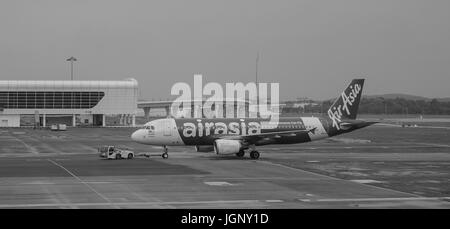 Kuala Lumpur, Malaysia - Dec 16, 2015. An AirAsia aircraft at the KLIA Airport in Kuala Lumpur, Malaysia. KLIA is the world 23rd-busiest airport by to Stock Photo