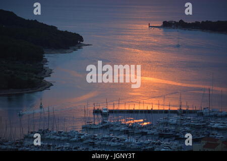 Cres, Croatia - June 17, 2017 - City of cres with boats during sunset Stock Photo
