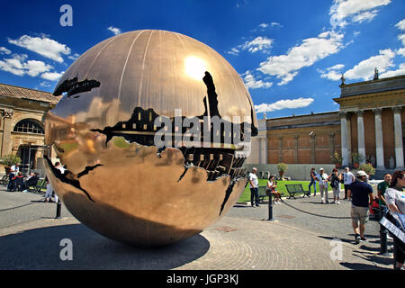 The Sphere within a Sphere (alson known as 'Sfera con Sfera'), artwork by Arnaldo Pomodoro in the courtyard of Vatican Museums, Vatican city. Stock Photo