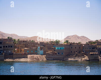 Typicl urban housing on the banks of the river Nile, Luxor Egypt Stock Photo