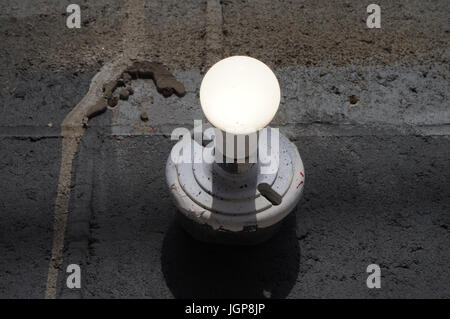 Light on Building Wall Stock Photo