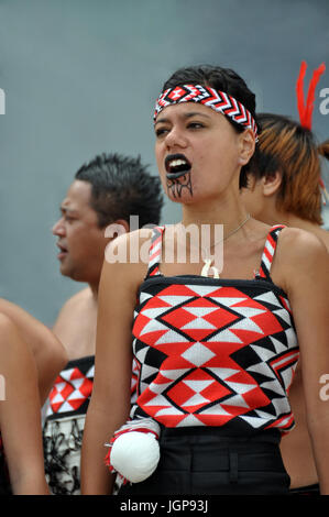 Maui, a traditional Maori song and dance group group, perform Maori Haka at the 18th World Buskers Festival.23 January 2011, Christchurch, New Zealand Stock Photo