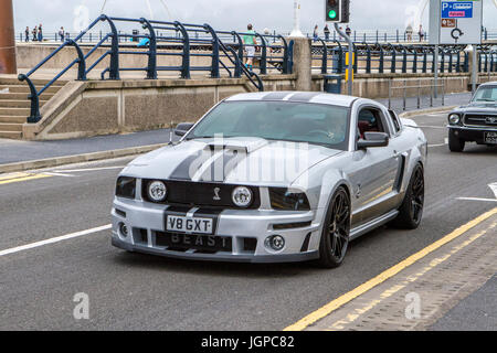 2005 Blurred moving car Shelby silver FORD MUSTANG GT AUTO 4600cc American muscle car; Slow camera shutter speed vehicle movement Stock Photo