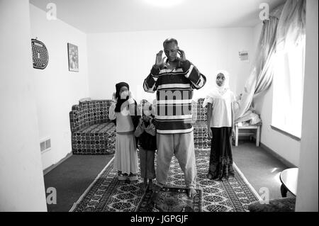 A Muslim, Somali refugee family in their new home in Portland, Oregon Stock Photo