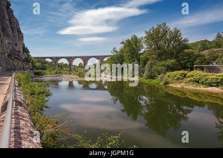 The bridge over the Ardeche river near the village of Vogue in the Ardeche region in France Stock Photo