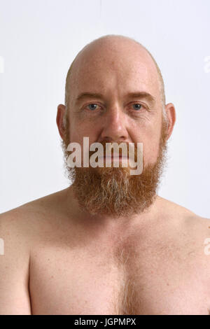 Portrait of red headed and bearded man playing famous artist isolated