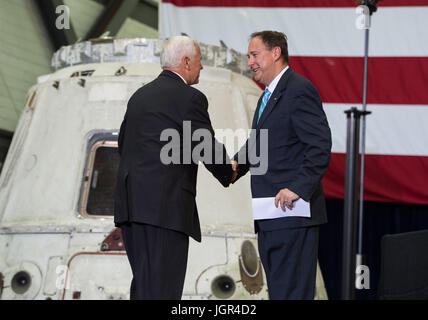 In this photo released by the National Aeronautics and Space Administration (NASA) United States Vice President Mike Pence shakes hands with Acting NASA Administrator Robert Lightfoot before addressing NASA employees, Thursday, July 6, 2017, at the Vehicle Assembly Building at NASA's Kennedy Space Center (KSC) in Cape Canaveral, Florida. The Vice President thanked employees for advancing American leadership in space, before going on a tour of the center that highlighted the public-private partnerships at KSC, as both NASA and commercial companies prepare to launch American astronauts from the Stock Photo